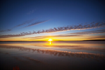 Fototapeta na wymiar Lake on sunset