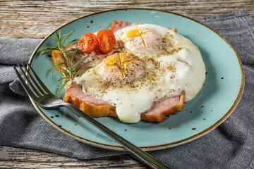 Fried eggs with pork ham.