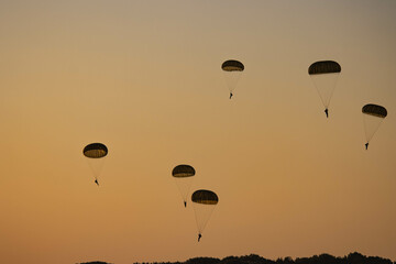 German Bundeswehr paratroopers in camouflage during a parachute jump