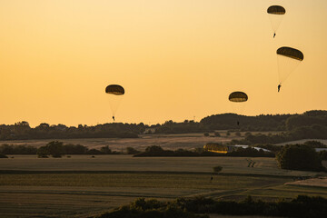 German Bundeswehr paratroopers in camouflage during a parachute jump