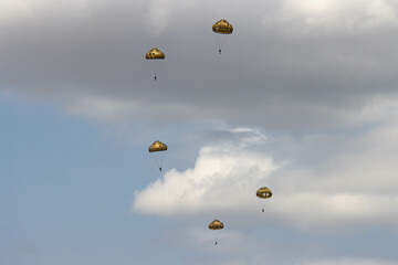 German Bundeswehr paratroopers in camouflage during a parachute jump
