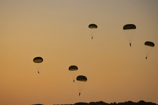 German Bundeswehr paratroopers in camouflage during a parachute jump