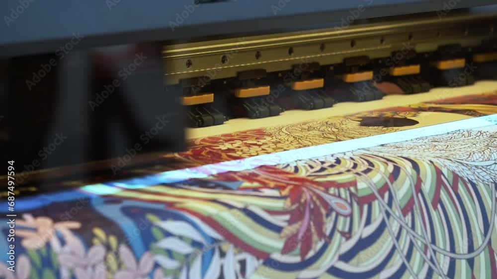 Poster large inkjet printer working, industrial printer, plotter head slides over the surface of the paper 