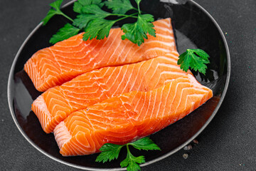 raw salmon pieces fresh delicious red fish healthy eating cooking appetizer meal food snack on the table copy space food background rustic top view keto or paleo diet pescetarian
