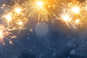 sparkling from fireworks and light bokeh. background for New Year's celebrations