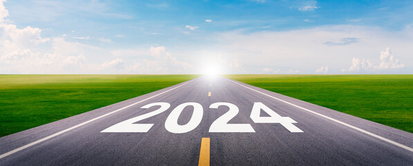 The new year 2024 or straightforward concept. Text 2024 written on the highway road. planning and...