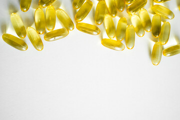 Cod liver oil omega 3 gel capsules. Fish oil capsules with omega 3 on white background.
