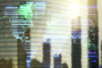 Double exposure of abstract digital world map on modern skyscrapers background, research and strategy concept