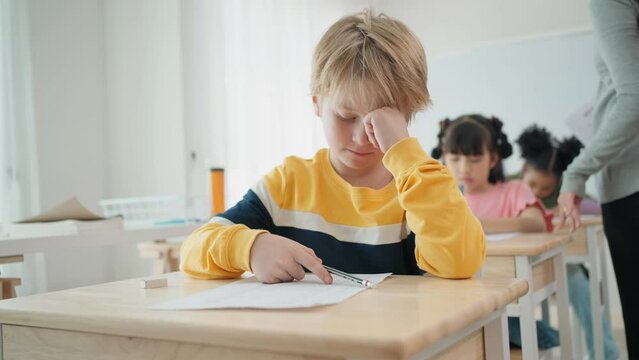 Elementary school students are stressing about doing their final exams in the exam room at school
