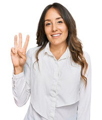 Young brunette woman wearing casual clothes showing and pointing up with fingers number three while smiling confident and happy.