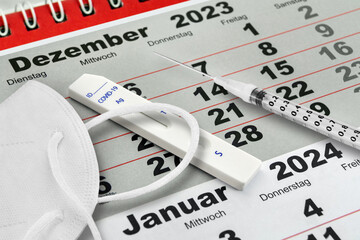 Corona Pandemie und Deutscher Kalender Dezember 2023 und Januar 2024 mit Antigen Test Schnelltest...