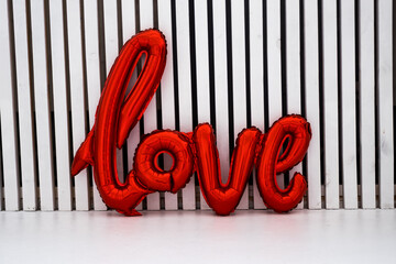 red word love made from balloons