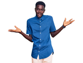 Young african american man wearing casual clothes smiling showing both hands open palms, presenting and advertising comparison and balance