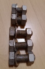 Mounting bolts of different lengths and nuts