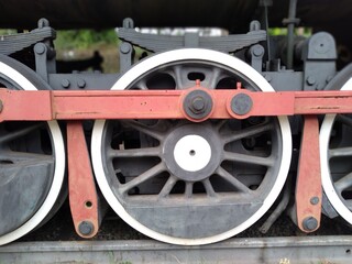 Fototapeta na wymiar Locomotive wheels on the rails