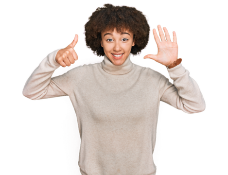 Young hispanic girl wearing wool winter sweater showing and pointing up with fingers number six while smiling confident and happy.