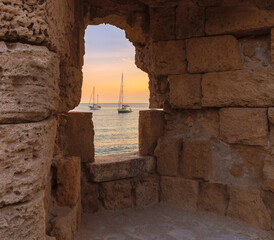 Old stone city wall in the city of Rhodes.