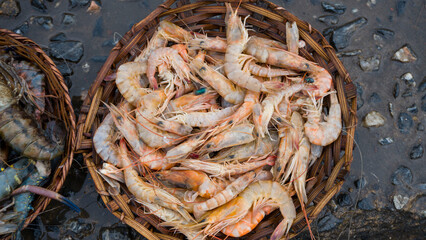A basket of shrimps at a roadside market