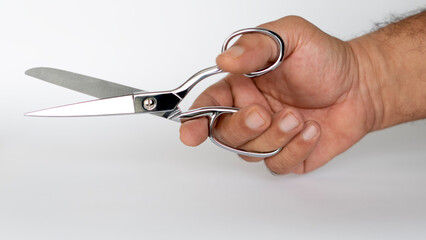 tailor hand part holding scissor 