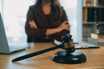 Lawyer, legal advisor, businessman brainstorming information on agreement details Business contracts in legal processing books for accuracy in contract documents. joint financial investment.