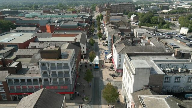 Preston, Lancashire, UK, September 06, 2023; Aerial clip of Fishergate high street shopping and over the town cityscape of Preston, Lancashire, England.