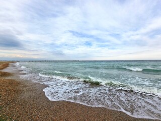 waves on the beach with sky