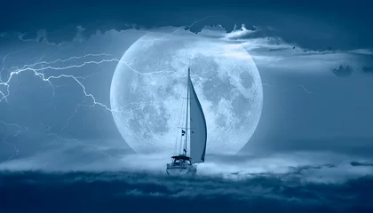 Rolgordijnen Sailing yacht in a stormy weather with thunder and lightning Super Full Moon in the background "Elements of this image furnished by NASA " © muratart