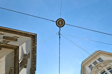 street light hanging on cables in the city of Vienna