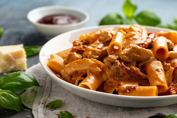Gochujang Pasta with chicken, sun dried tomatoes and pecorino cheese.