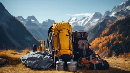  Backpack, trekking poles and sleeping mat in mountains, space for text. Tourism equipment © alexkich