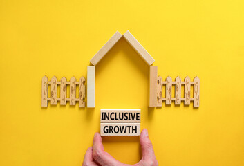 Inclusive growth symbol. Concept words Inclusive growth on beautiful wooden blocks. Beautiful...
