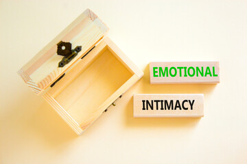 Emotional intimacy symbol. Concept words Emotional intimacy on beautiful wooden blocks. Beautiful...