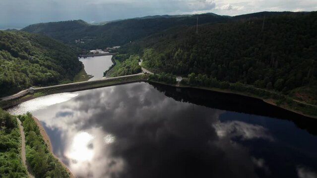Aerial drone video of flight over the lake in Bad Lauterberg Germany.