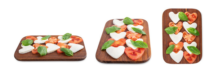 Caprese salad with tomatoes and mozzarella in the shape of hearts for Valentine's Day on a white isolated background