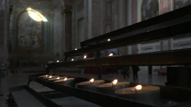candles in church, rome, italy, s-log video