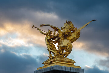 Fototapeta na wymiar Column with golden statue Paris, France
