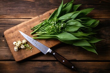 Rustic Wooden Surface with Fresh Ramson, Kitchen Knife, and Allium Plant Leaf - Perfect for Culinary Inspirations - obrazy, fototapety, plakaty