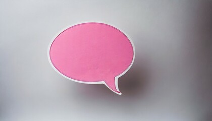 pink blank cut out paper cardboard speech bubble of elliptical round shape with copy space for text on or white background