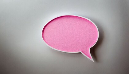 pink blank cut out paper cardboard speech bubble of elliptical round shape with copy space for text on or white background