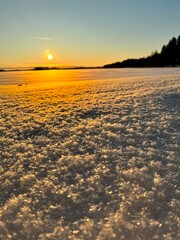 Wintry sunset image on the lake shore. - 687636385