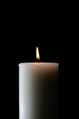 white candlelight with black background 