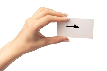 Arrow sign on a card in a woman hand isolated.