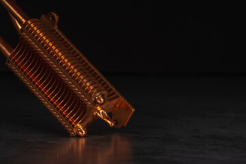Copper computer radiator on metal background