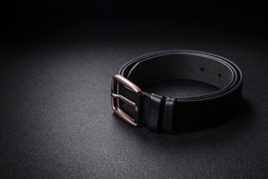 New leather men's belt with an old-style metal buckle