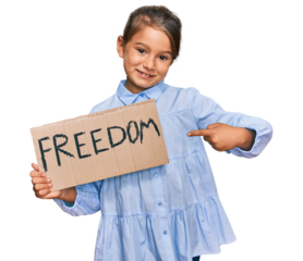 Little beautiful girl holding freedom banner smiling happy pointing with hand and finger