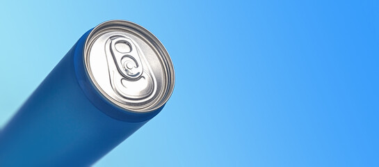 Aluminum can on a blue background. Close-up. Soft blur. A modern container for drinks. Copy space.