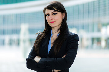 Confident businesswoman in urban setting