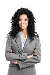 Confident professional woman standing with arms crossed