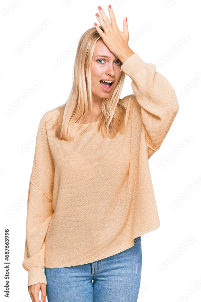 Canvas Prints young blonde girl wearing casual clothes surprised with hand on head for mistake, remember error. fo