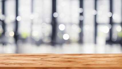 Empty wooden table and blur spacious office hall interior background, product display montage.